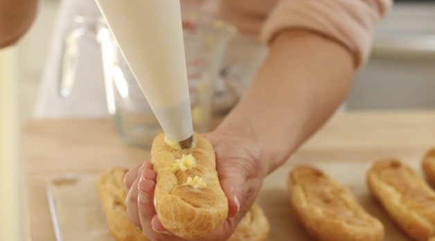 filling eclairs with pastry cream 