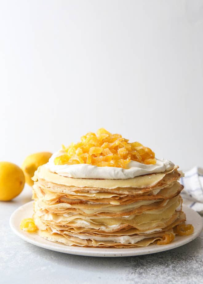 A tall tower of crepes, lemon curd and mascarpone cream