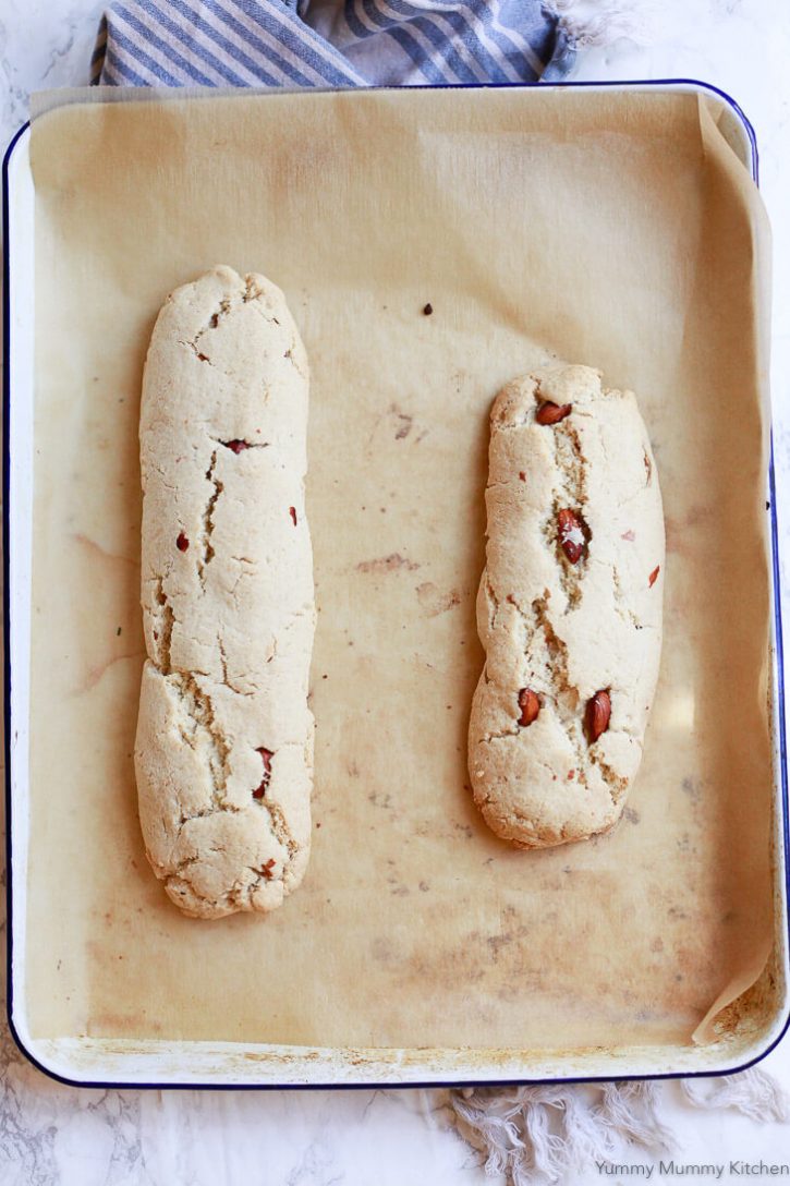 Biscotti logs on a cookie sheet after the fist baking. 