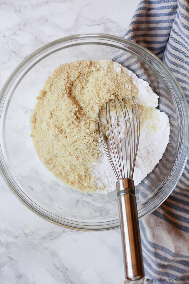 Almond flour and arrowroot starch whisked together in a bowl to make gluten free vegan biscotti. 