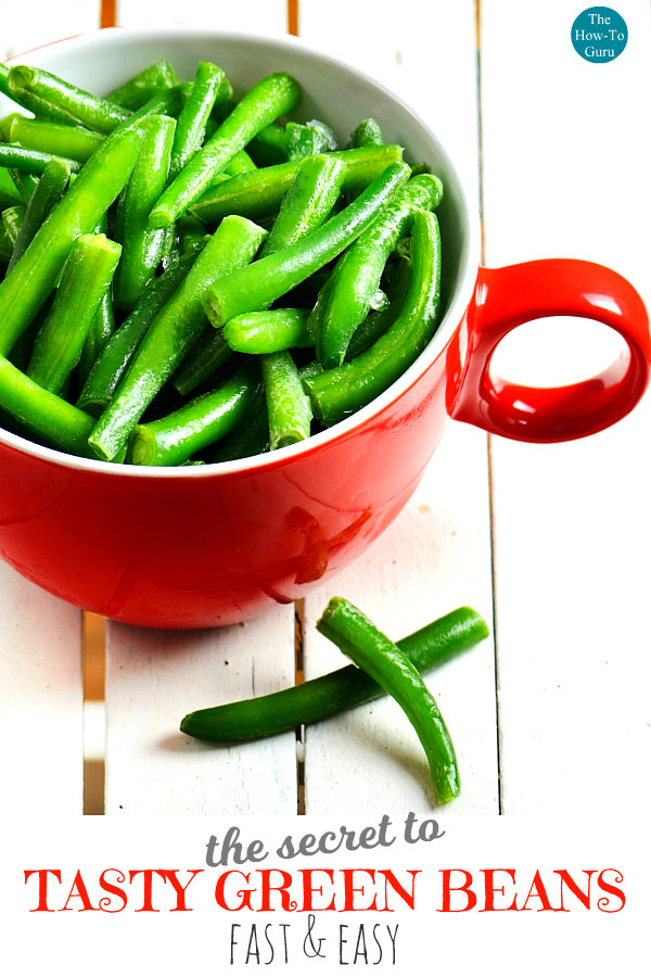 close up of how to cook green beans - in red mug