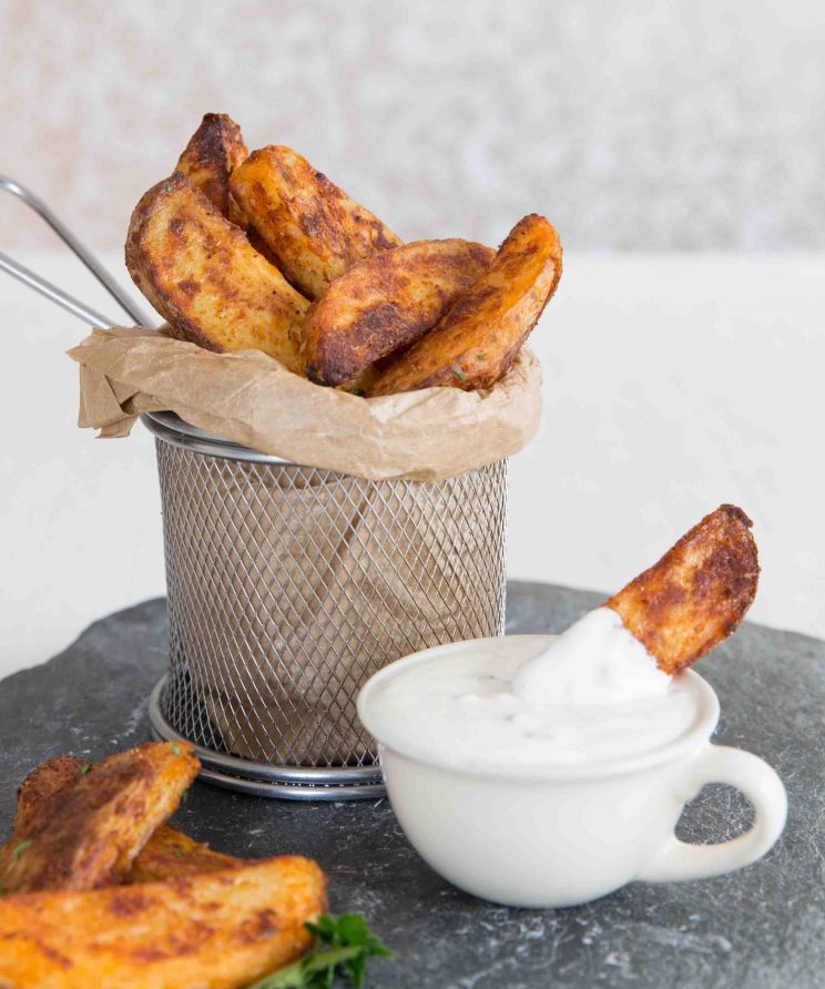 oven baked potato wedges served with dipping sauce