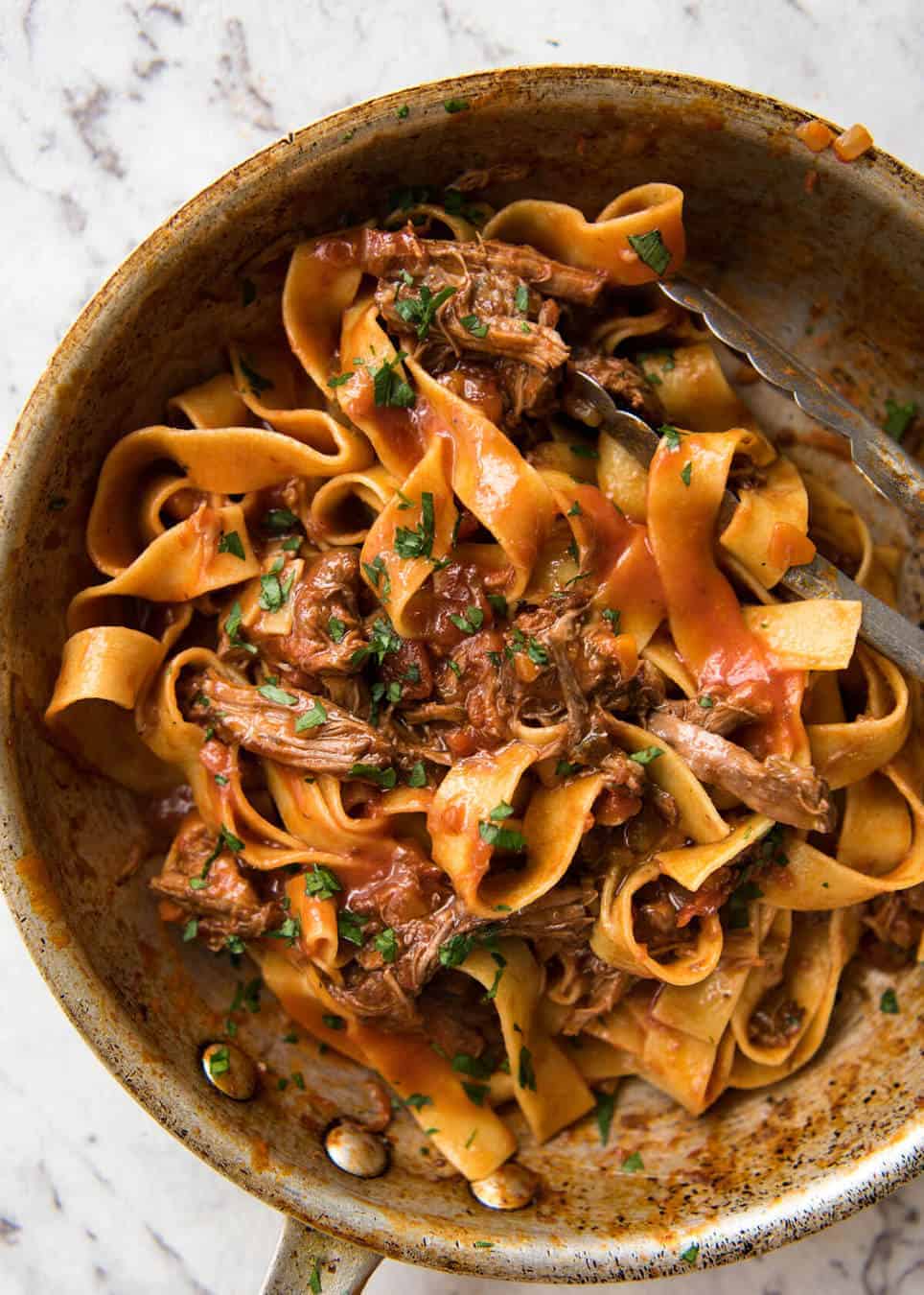 Rich, slow cooked Shredded Beef Ragu Sauce with pappardelle pasta. Stunning Italian comfort food at its best. recipetineats.com